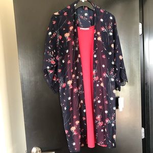Pink halter dress with navy blue floral cover-up